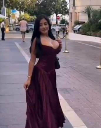 Buxom Beauty Rocking a Stunning Dress 1