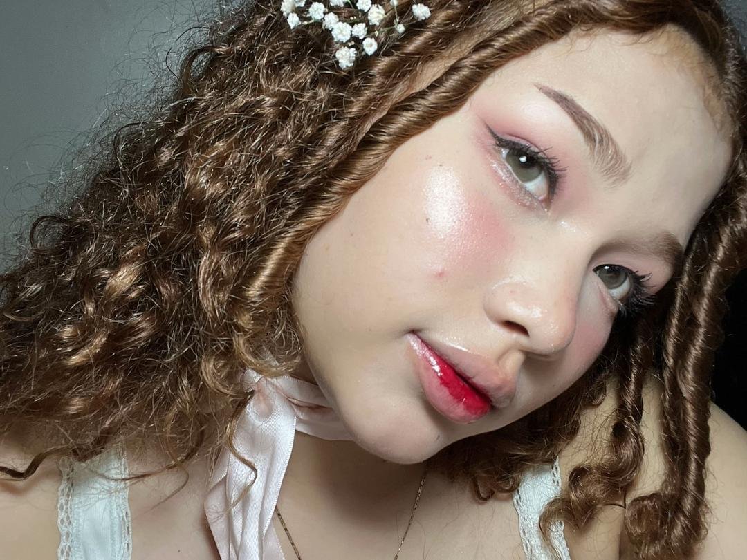 Curly-Haired Redhead Riding Cock Like She Owns It 6