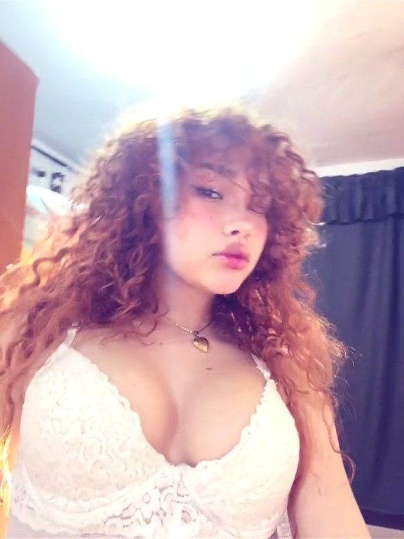 Naughty Asian Redhead Showing Off That Tight Curly Hair and Body 4
