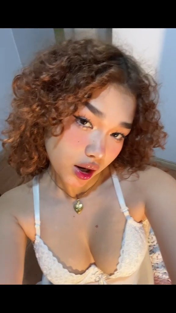 Naughty Asian Redhead Showing Off That Tight Curly Hair and Body 49