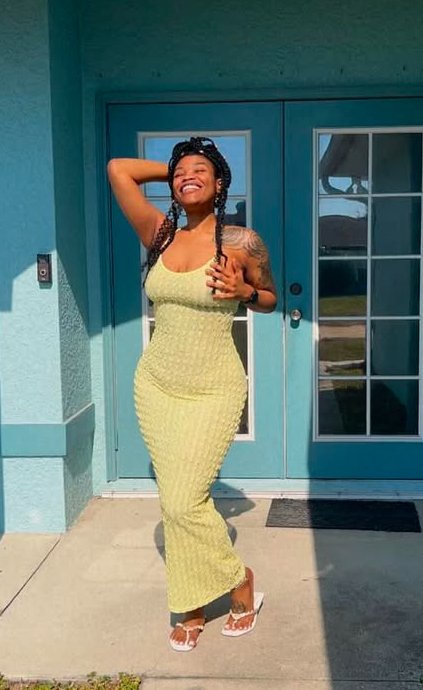 Ebony Temptress Teasing In A Tight Dress 2