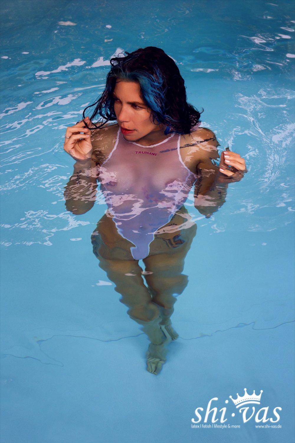 Fit Diva Looks Mouthwatering In Her See-Through Swimsuit 10