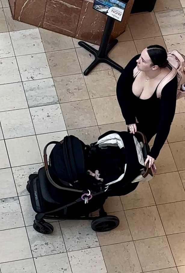 Busty Young MILF Flashes Her Deep Cleavage In A Sexy Candid Moment 2