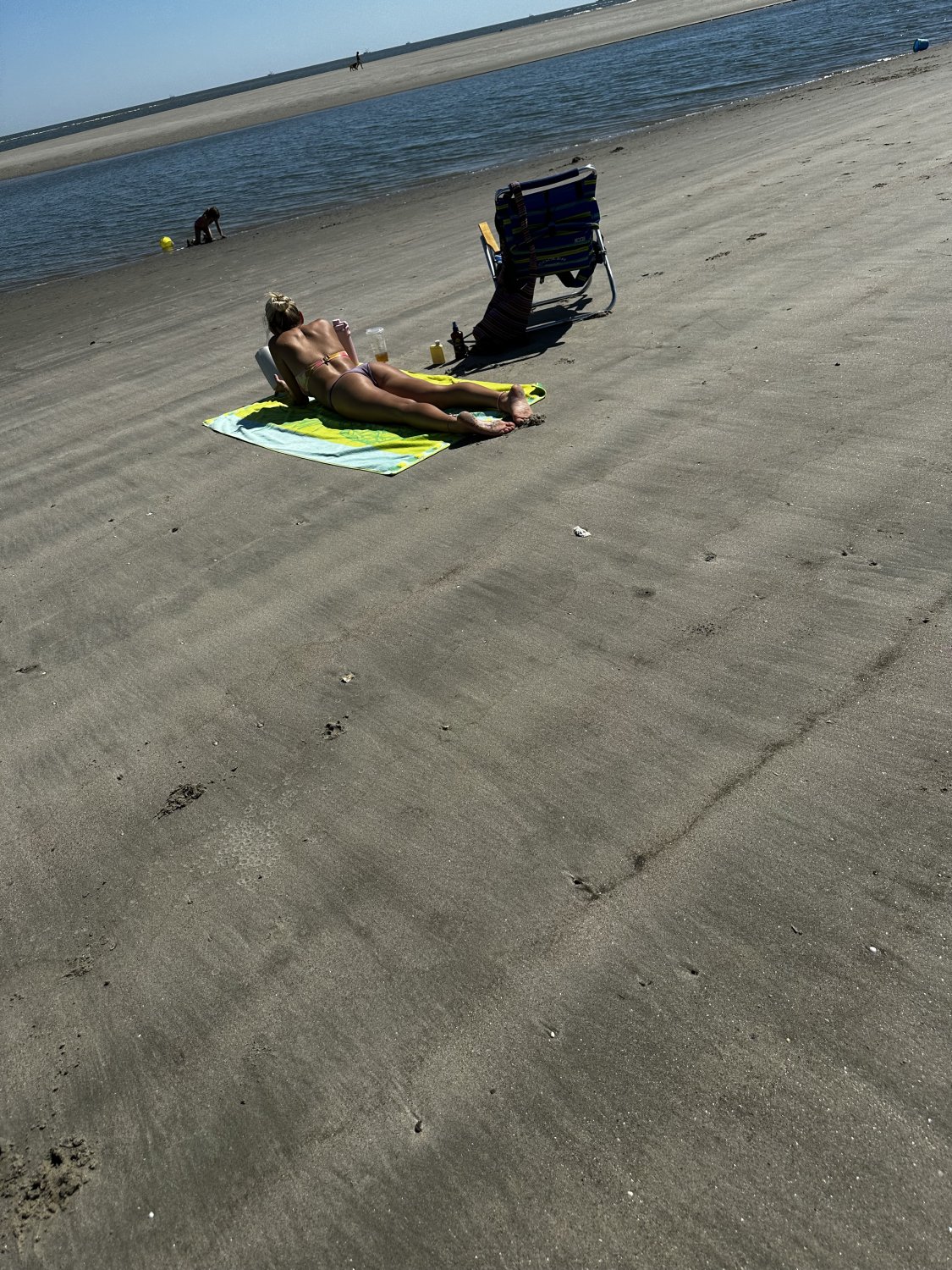 Blond Beach Babe Showing Off Tight Body In Tiny Bikini 1