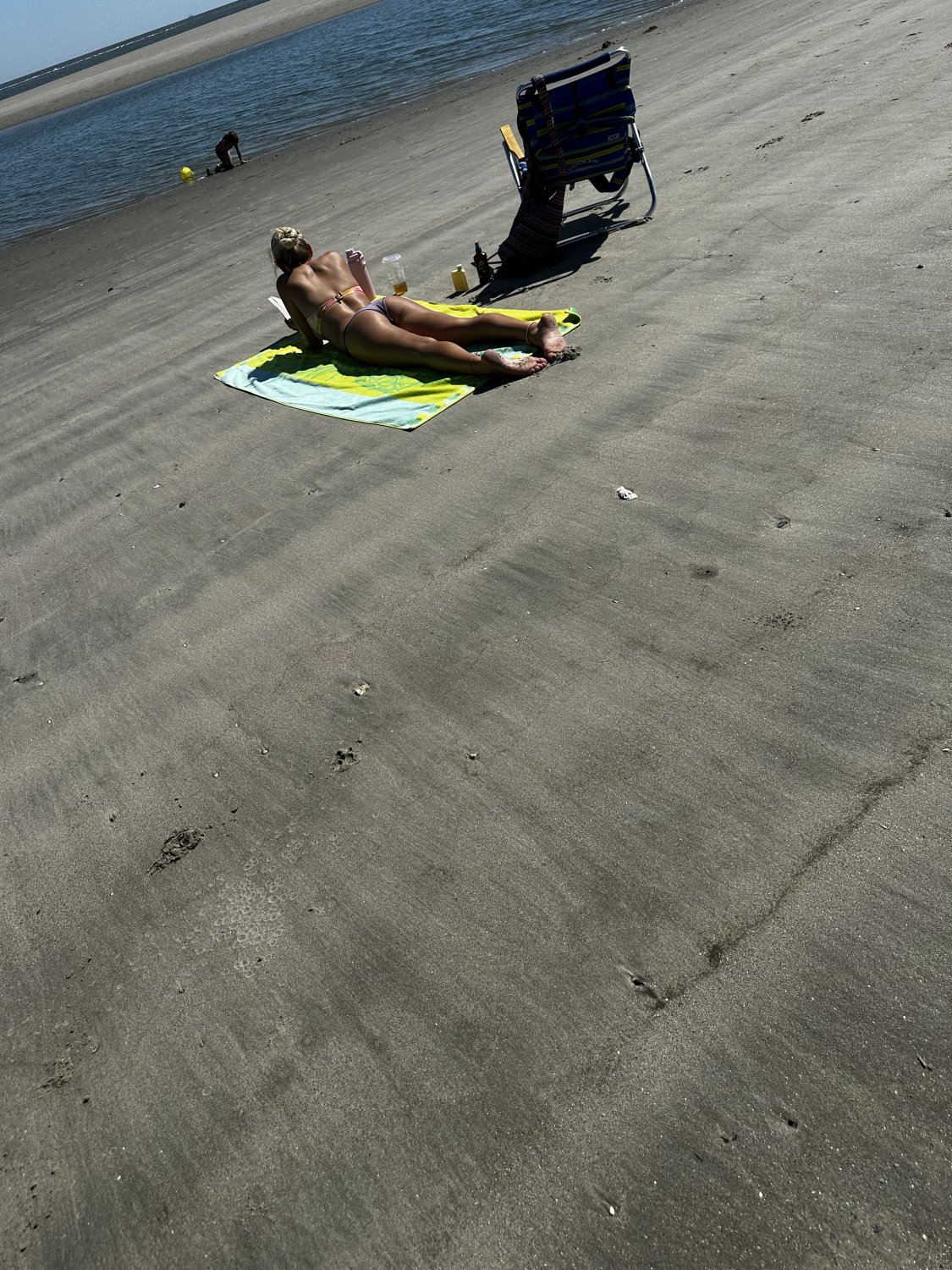 Blond Beach Babe Showing Off Tight Body In Tiny Bikini 2