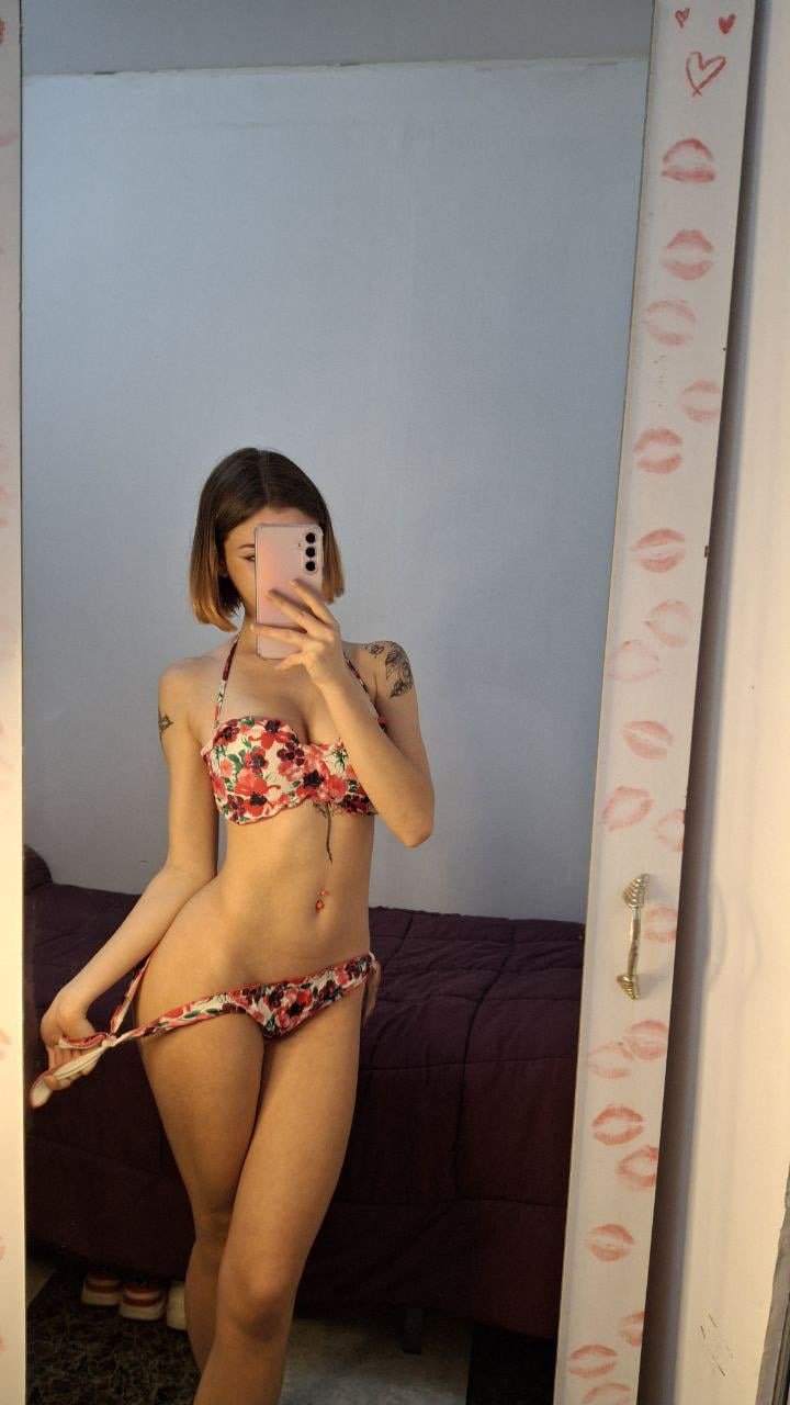Charming Latina Girl Teasing With Her Tattooed Feet and Pantyhose 6