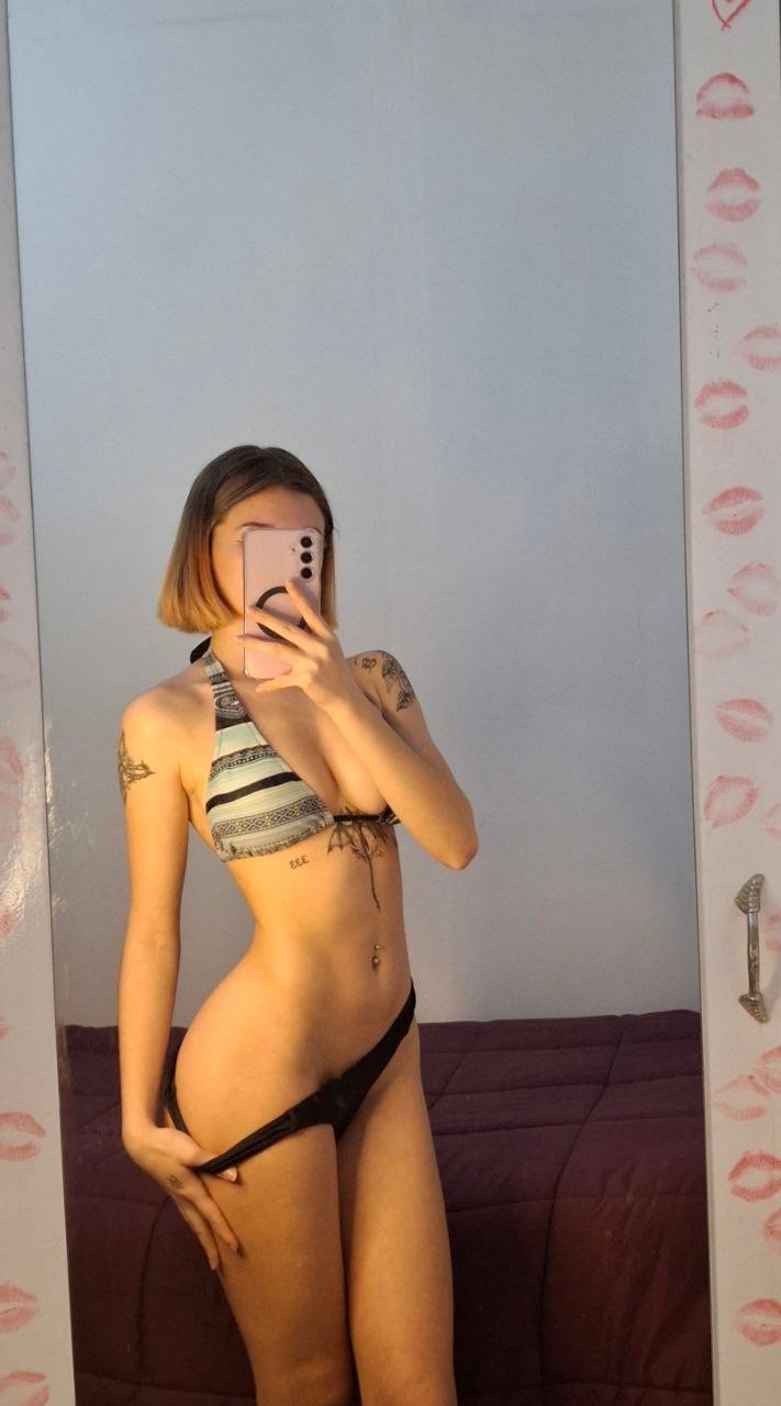 Charming Latina Girl Teasing With Her Tattooed Feet and Pantyhose 7