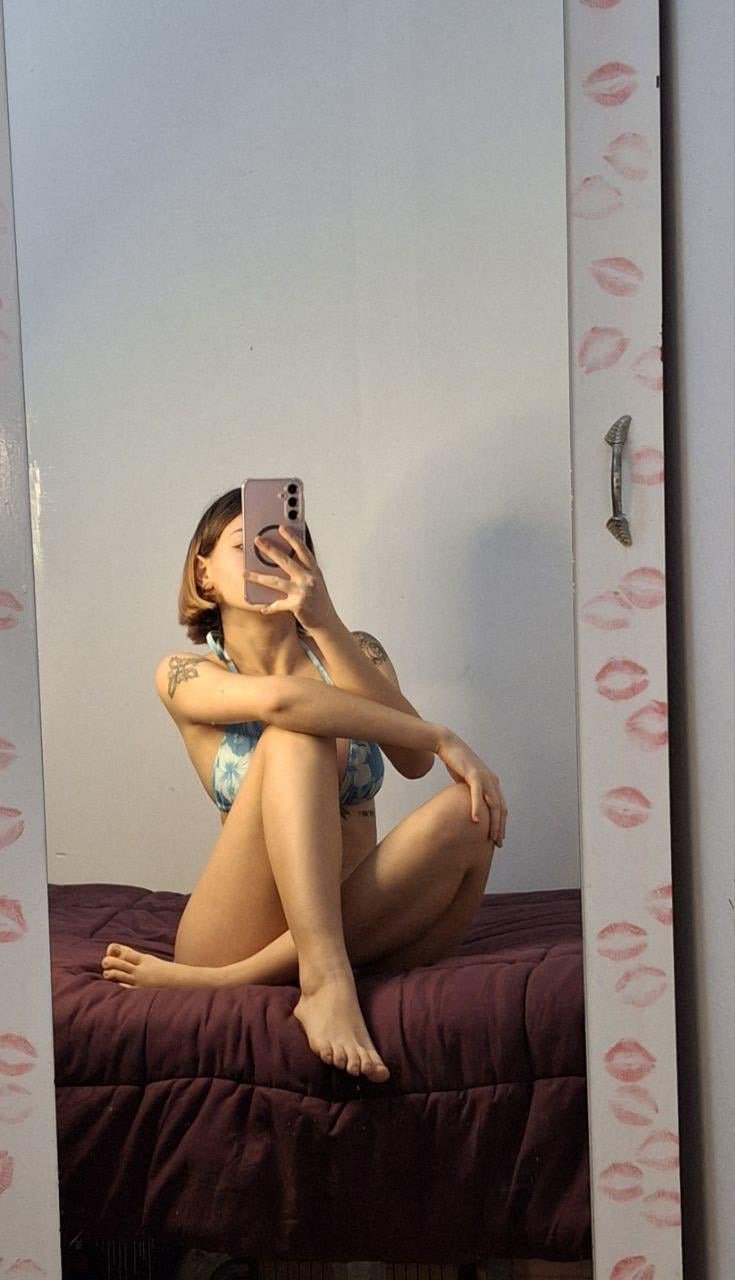 Charming Latina Girl Teasing With Her Tattooed Feet and Pantyhose 9