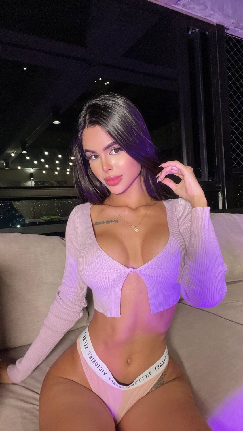 Beautiful Brunette Showing Off Her Stunning Curves 1