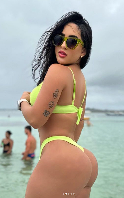 Latina MILF Shakes Her Booty in a Tiny Bikini 9