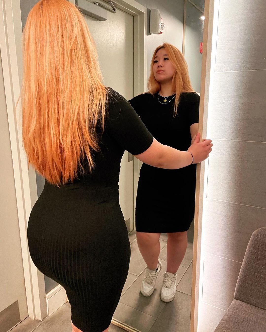 Short Asian Babe In A Dress Teases The Camera 6