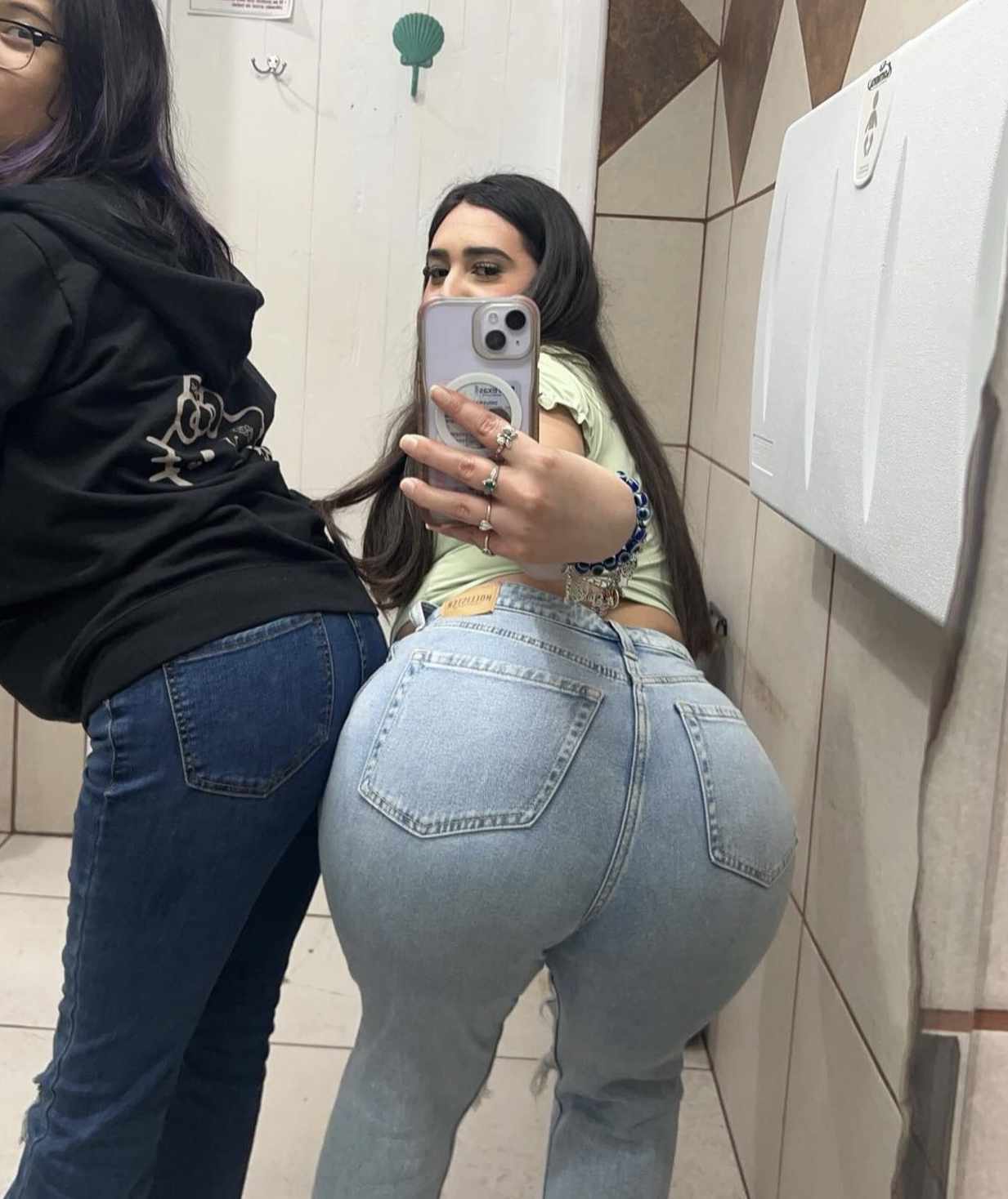 Tight Jeans Hug Her Juicy Booty Just Right 5