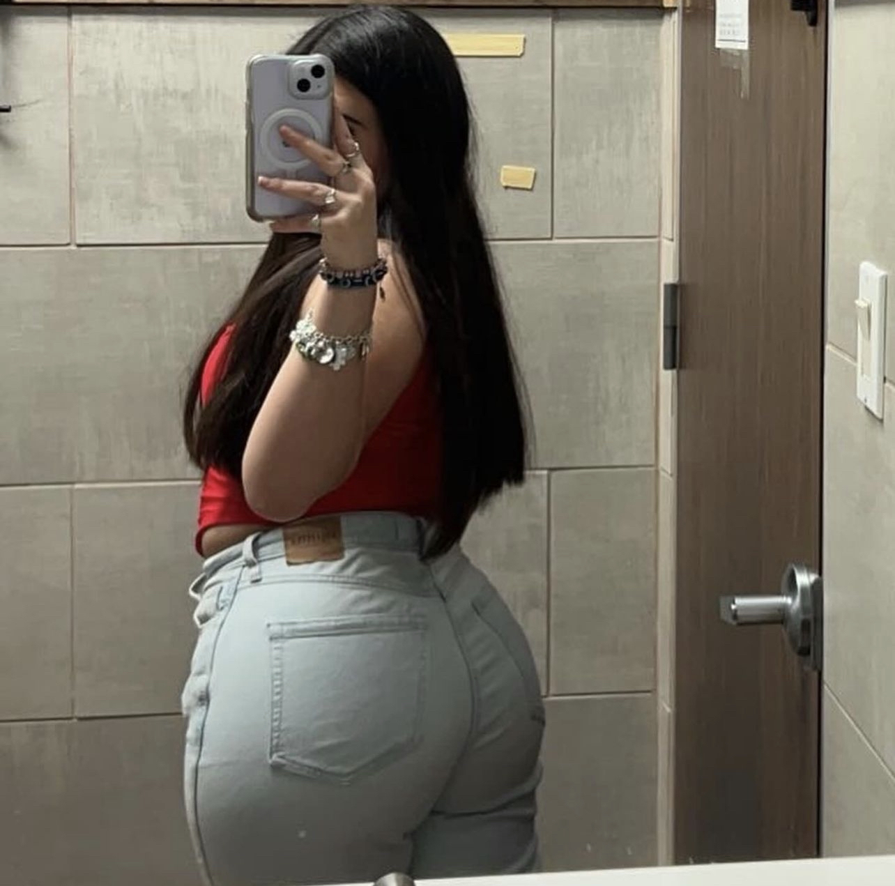 Tight Jeans Hug Her Juicy Booty Just Right 6