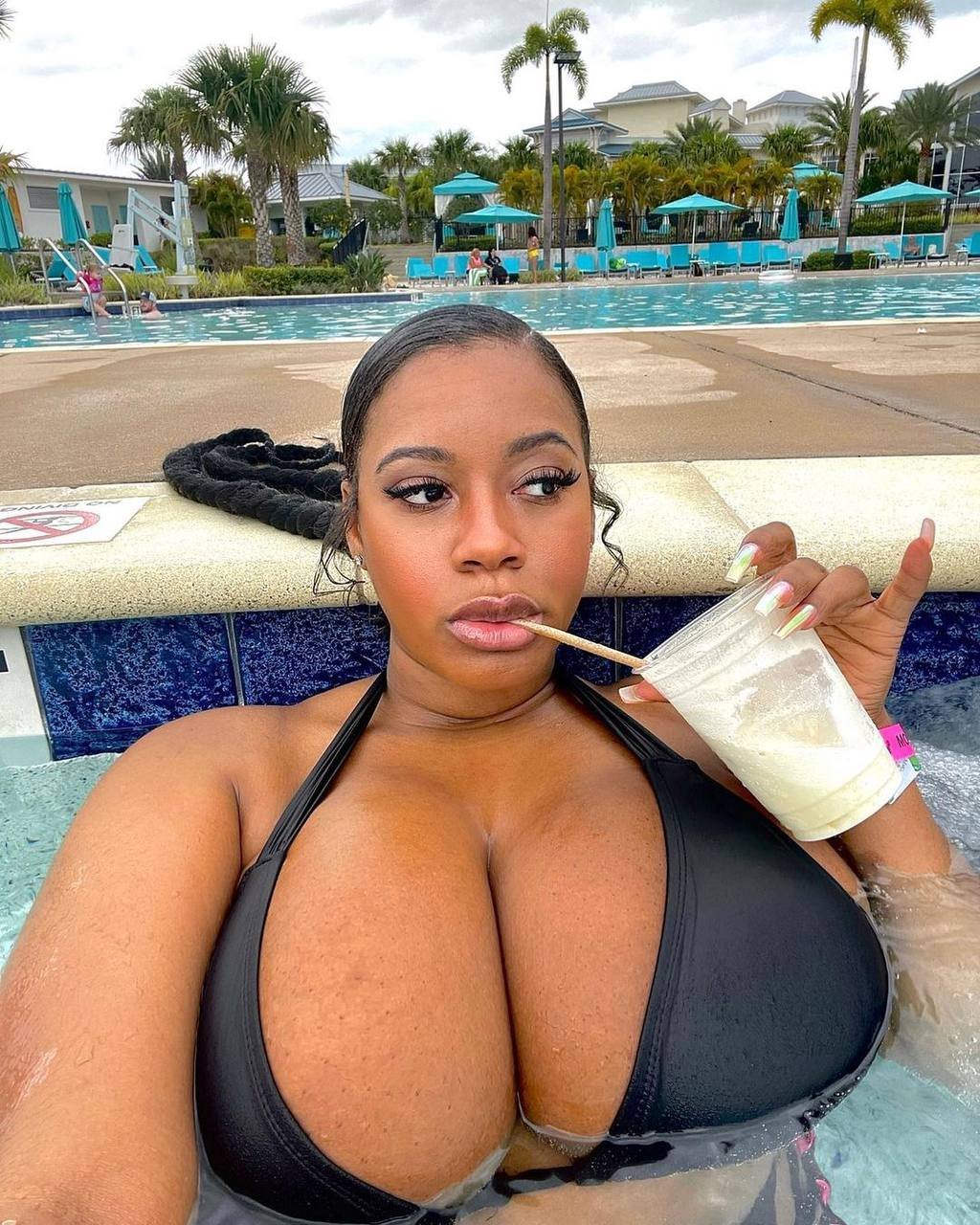 Curvy Ebony Bombshell Shows Off Her Big Tits and Wet Body 6