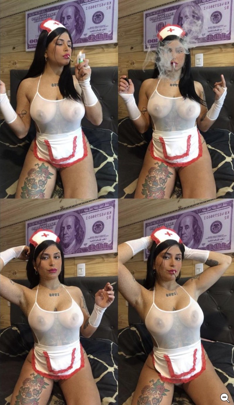 Tattooed vixen shows off her ink while seducing the lens 6