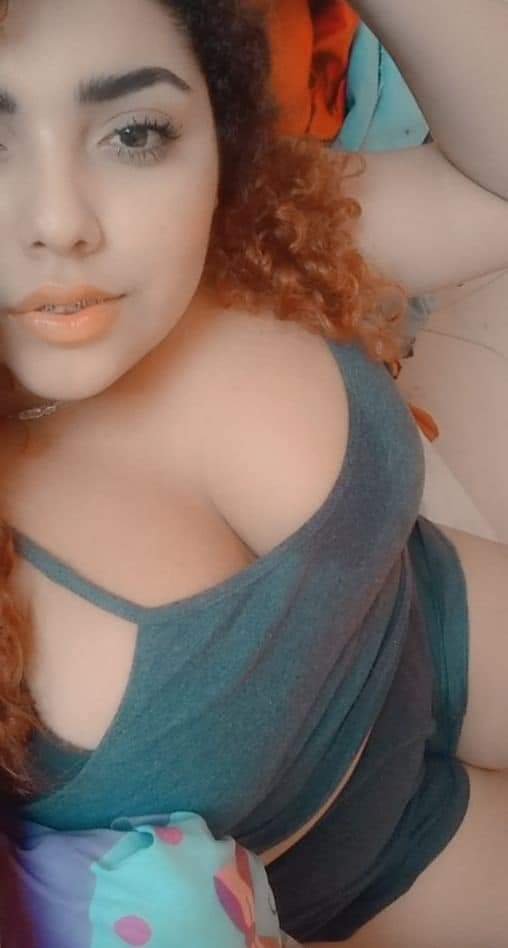Redhead with Glasses and Curves That Don't Quit 1