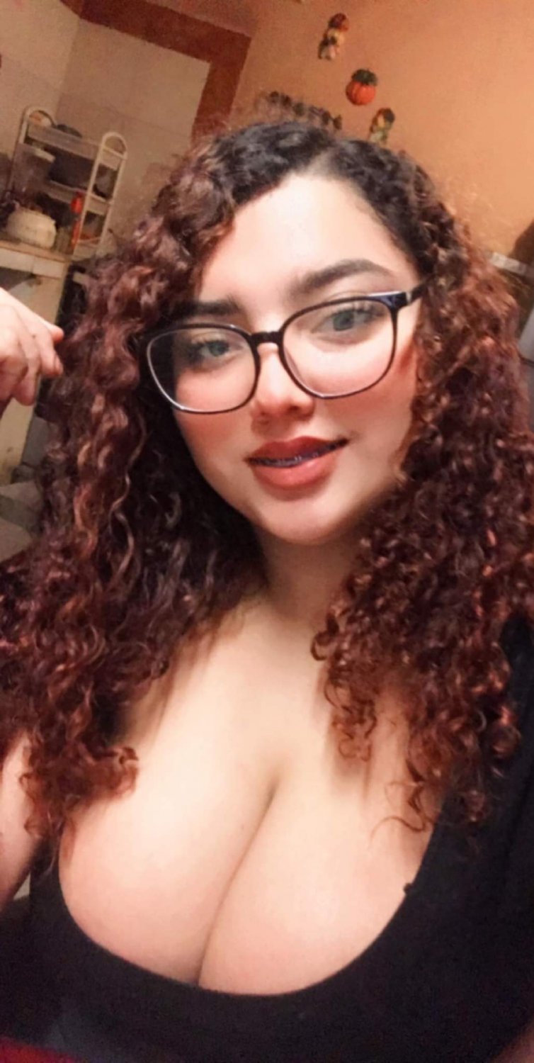 Redhead with Glasses and Curves That Don't Quit 5
