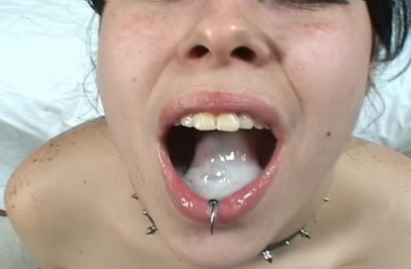 Cum Drips On Her Tongue As She Smiles 26