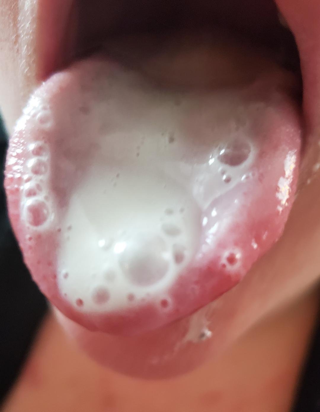 Cum Drips On Her Tongue As She Smiles 28