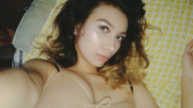 Michelle 22: Hot Asian MILF Teases With Her Eyes 15