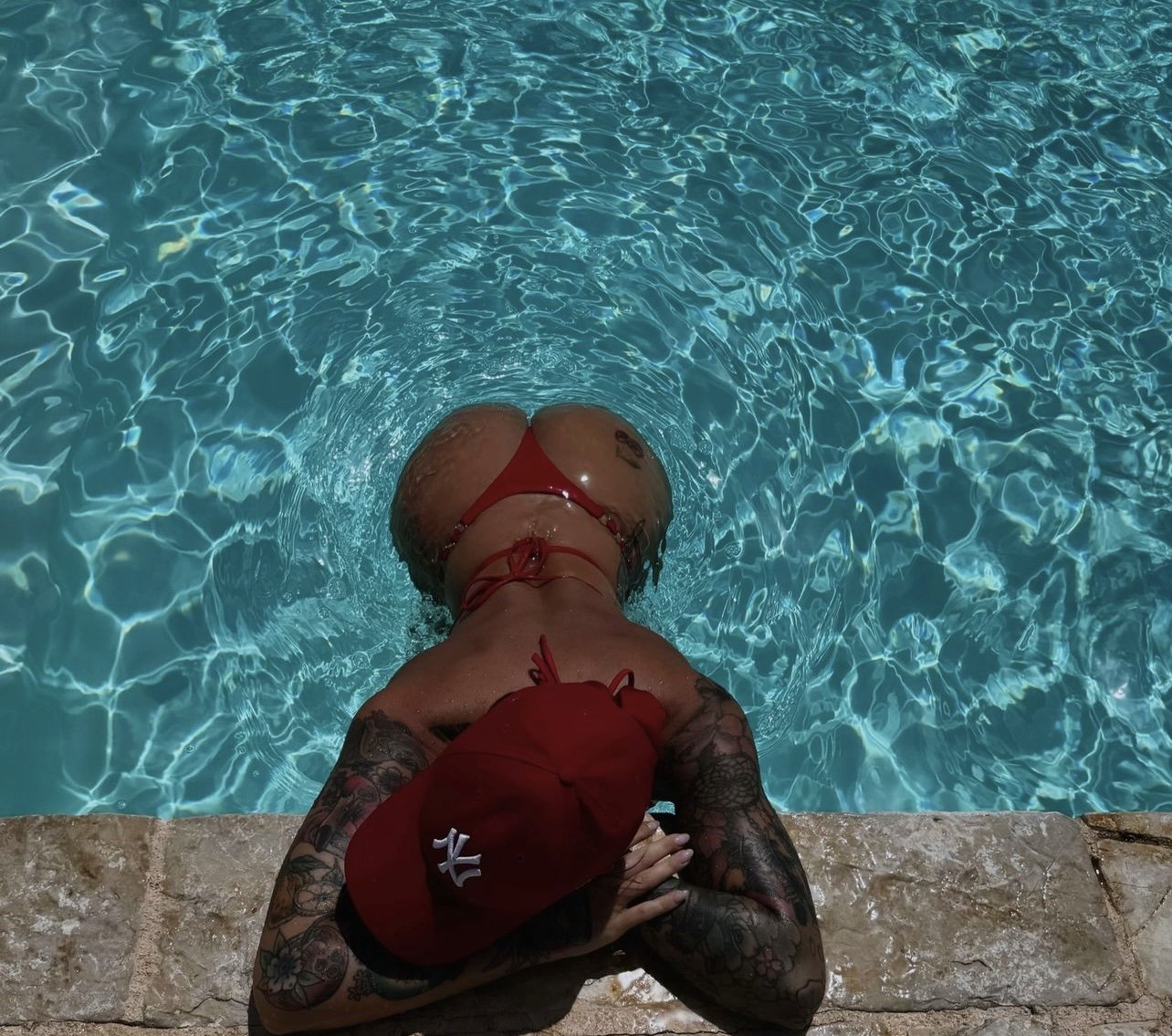 Tattooed Milf In Bikini Showing Off Her Perfect Curves 49