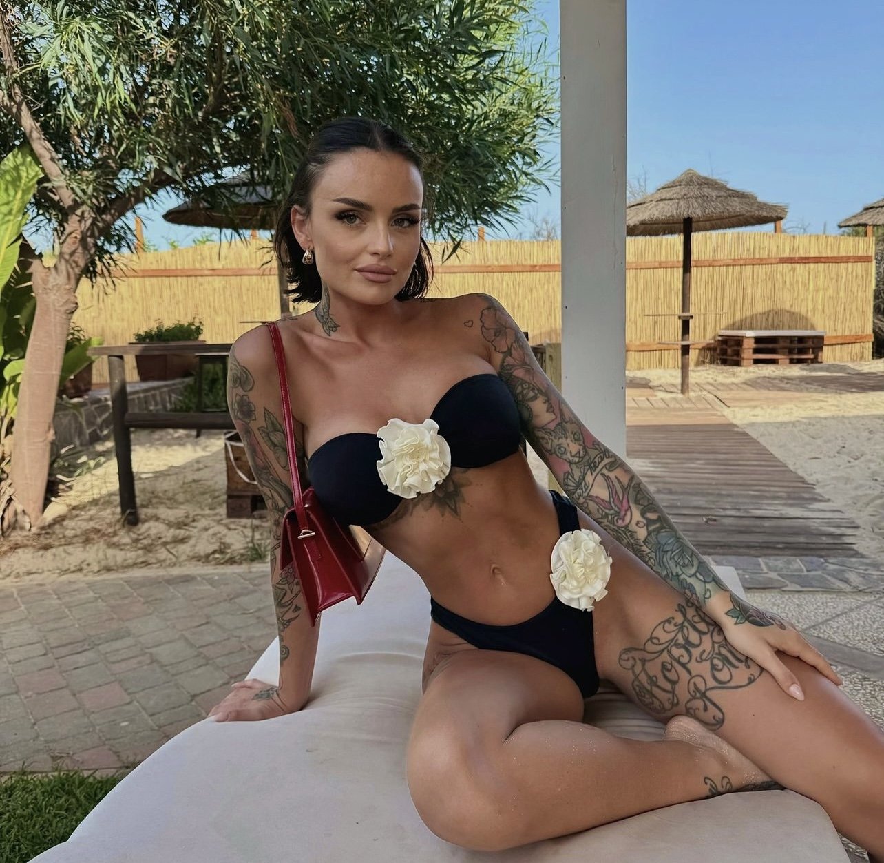 Tattooed Milf In Bikini Showing Off Her Perfect Curves 50