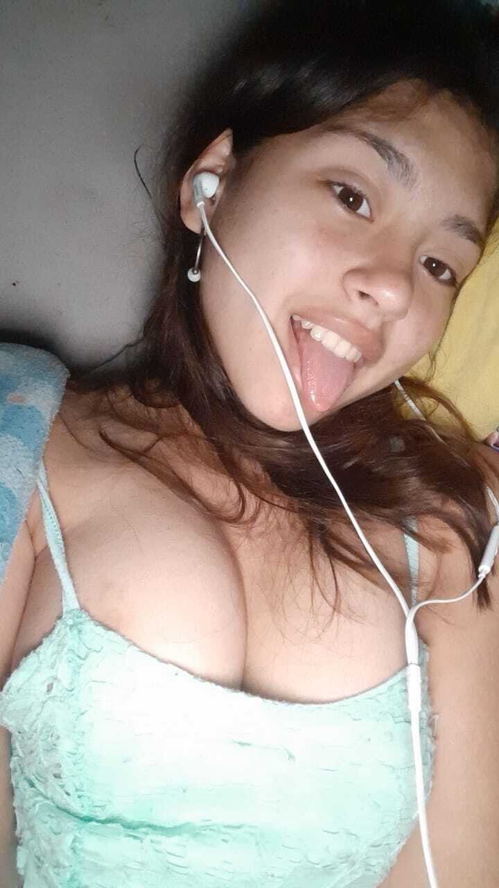 Barely Legal Sweetheart Strips Completely Nude and Shows Off That Tight Body 6