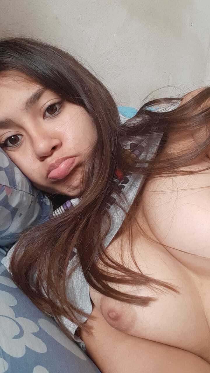 Barely Legal Sweetheart Strips Completely Nude and Shows Off That Tight Body 25